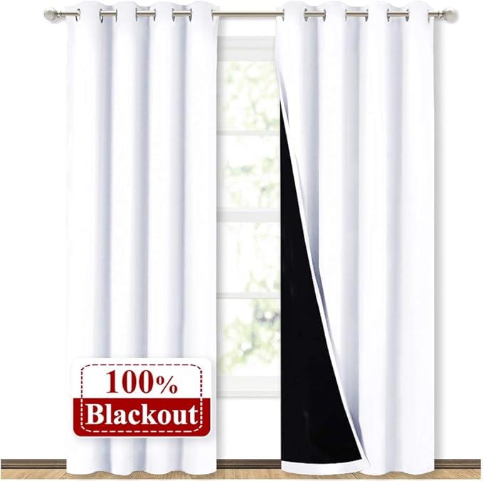 NICETOWN 100% Blackout Window Curtain Panels, Cold and Full Light Blocking Drapes with Black Liner for Nursery, 84 inches Drop Thermal Insulated Draperies (White, 2 Pieces, 52 Wide Each Panel) by NICETOWN